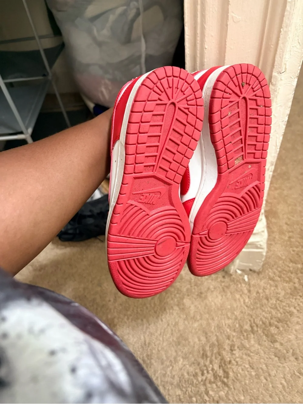 Nike Kids Red and White Low-Top Sneakers with Bold Swoosh